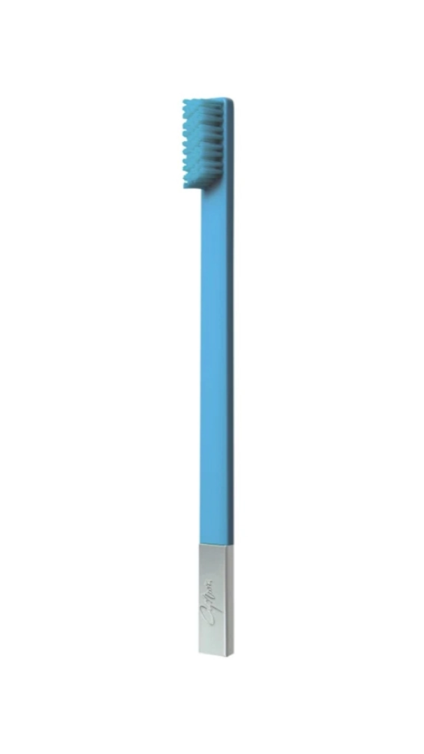 A light blue and silver soft toothbrush with a SLIM design, branded by APRIORI.