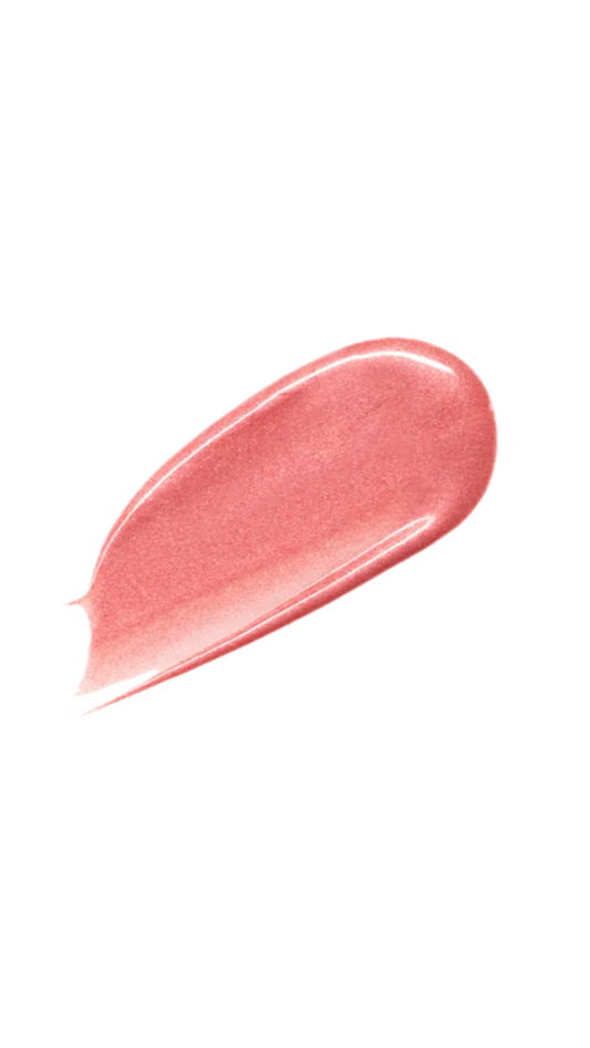 Pink lip gloss swatch on a white background