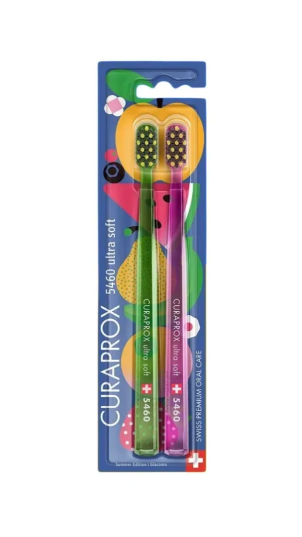 Two children's toothbrushes in a Curaprox packaging on a white background