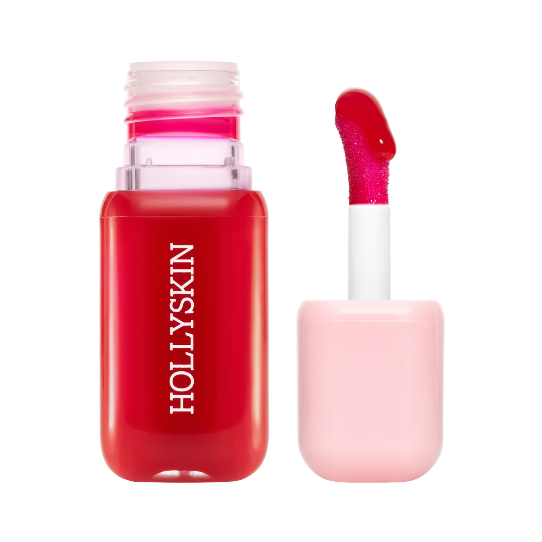 Red lip gloss with pink applicator on a white background