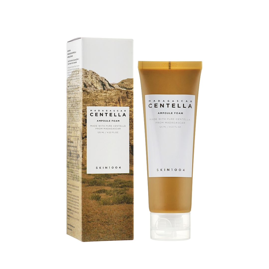 Skincare product with packaging featuring a desert landscape design.