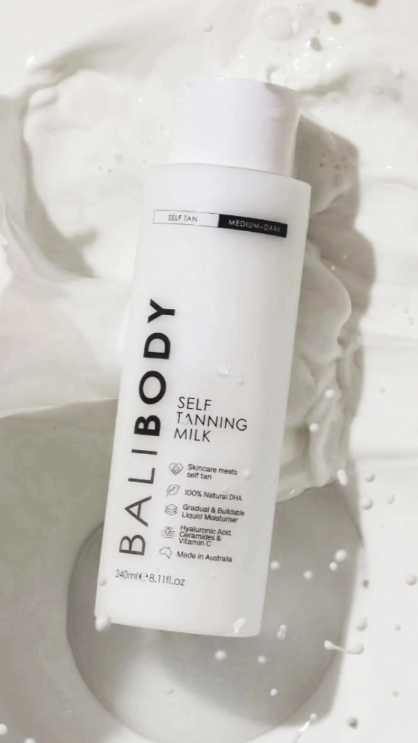 Bali Body self-tanning milk bottle on a white background