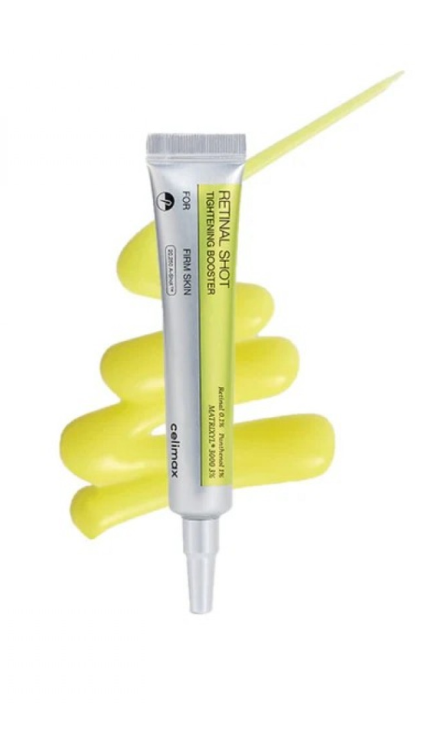 Skincare serum tube with applicator on a white background