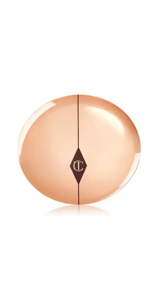 Rose gold compact with brand logo on a white background