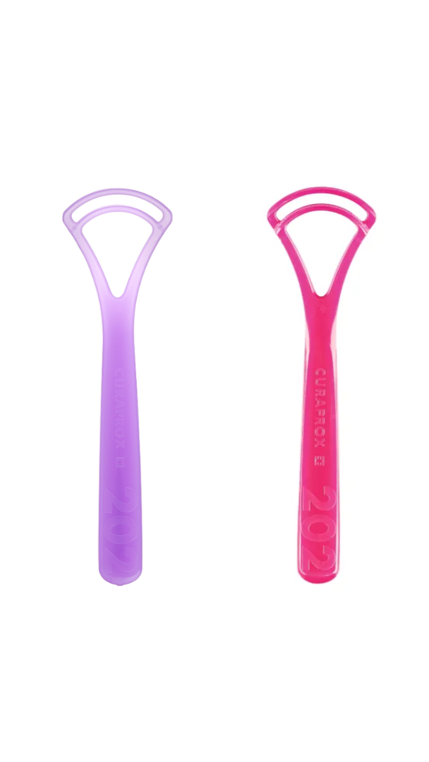 Two plastic tools, one purple and one pink, on a white background