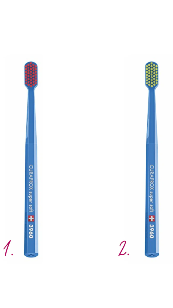 Two blue toothbrushes with different bristle patterns on a white background
