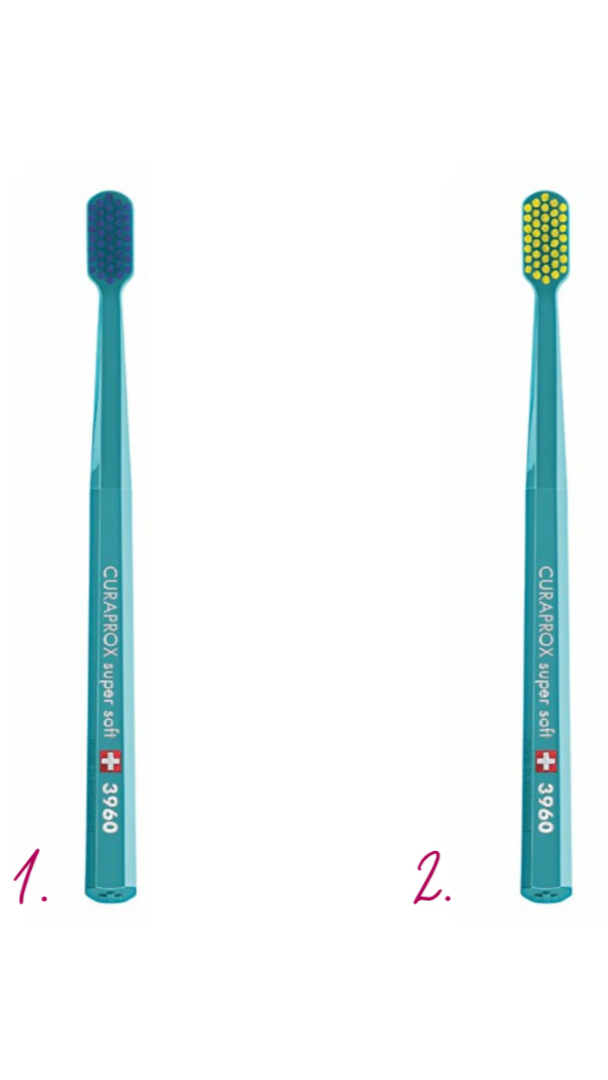 Two blue toothbrushes with different bristle patterns on a white background
