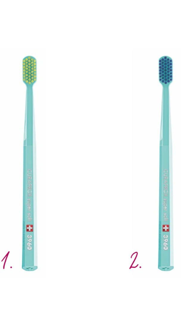 Two toothbrushes with different bristle colors on a white background