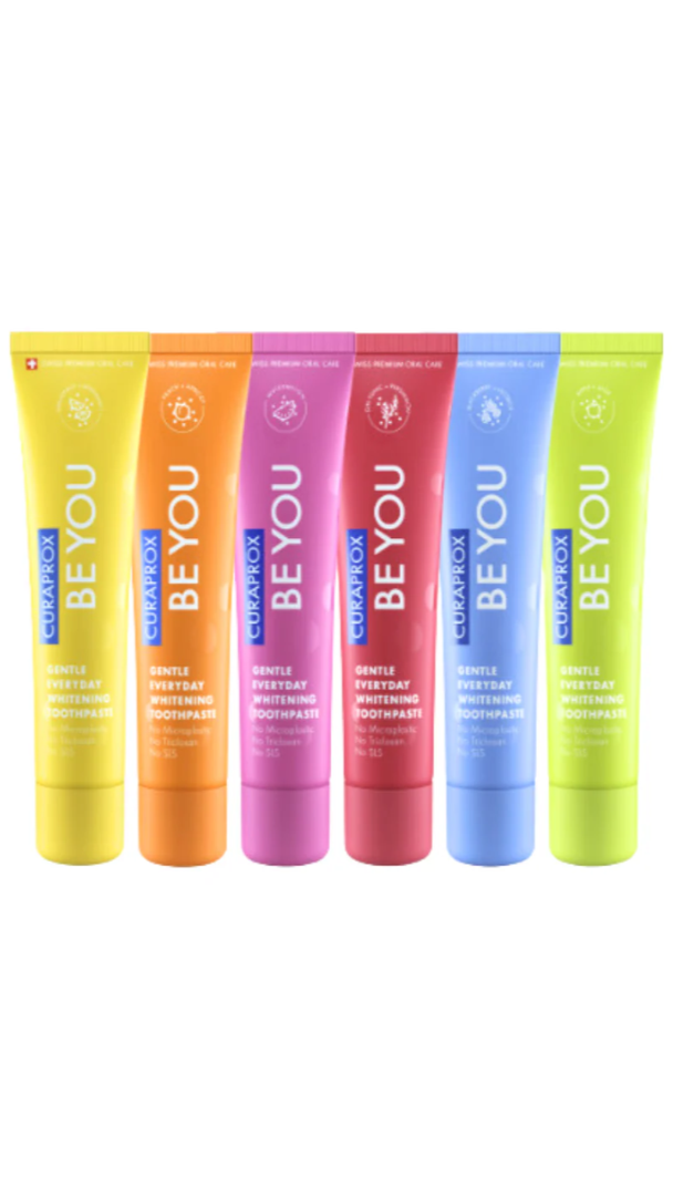 Five colorful tubes of 'BE YOU' deodorant on a white background