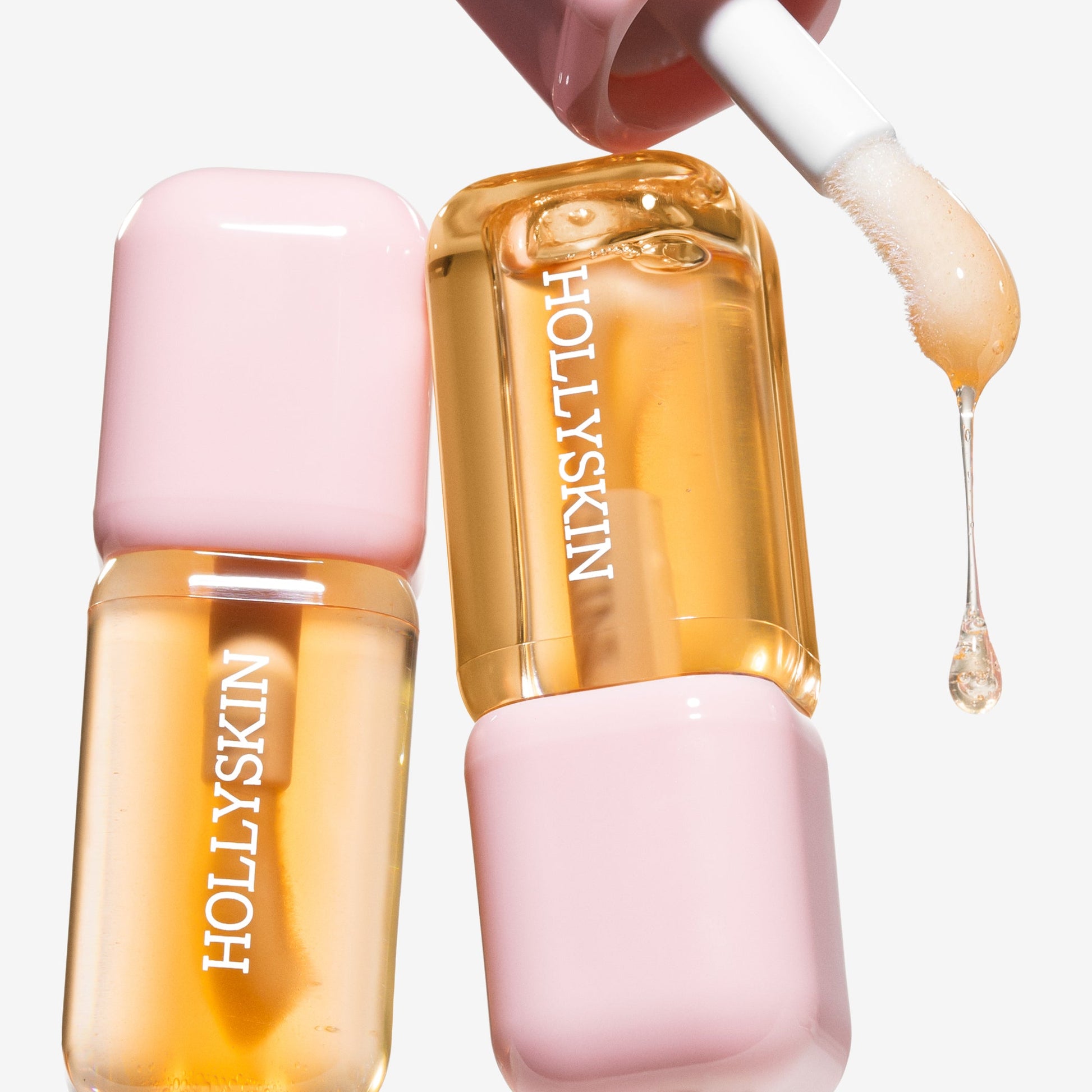 Hollyskin skincare product with dropper on a white background